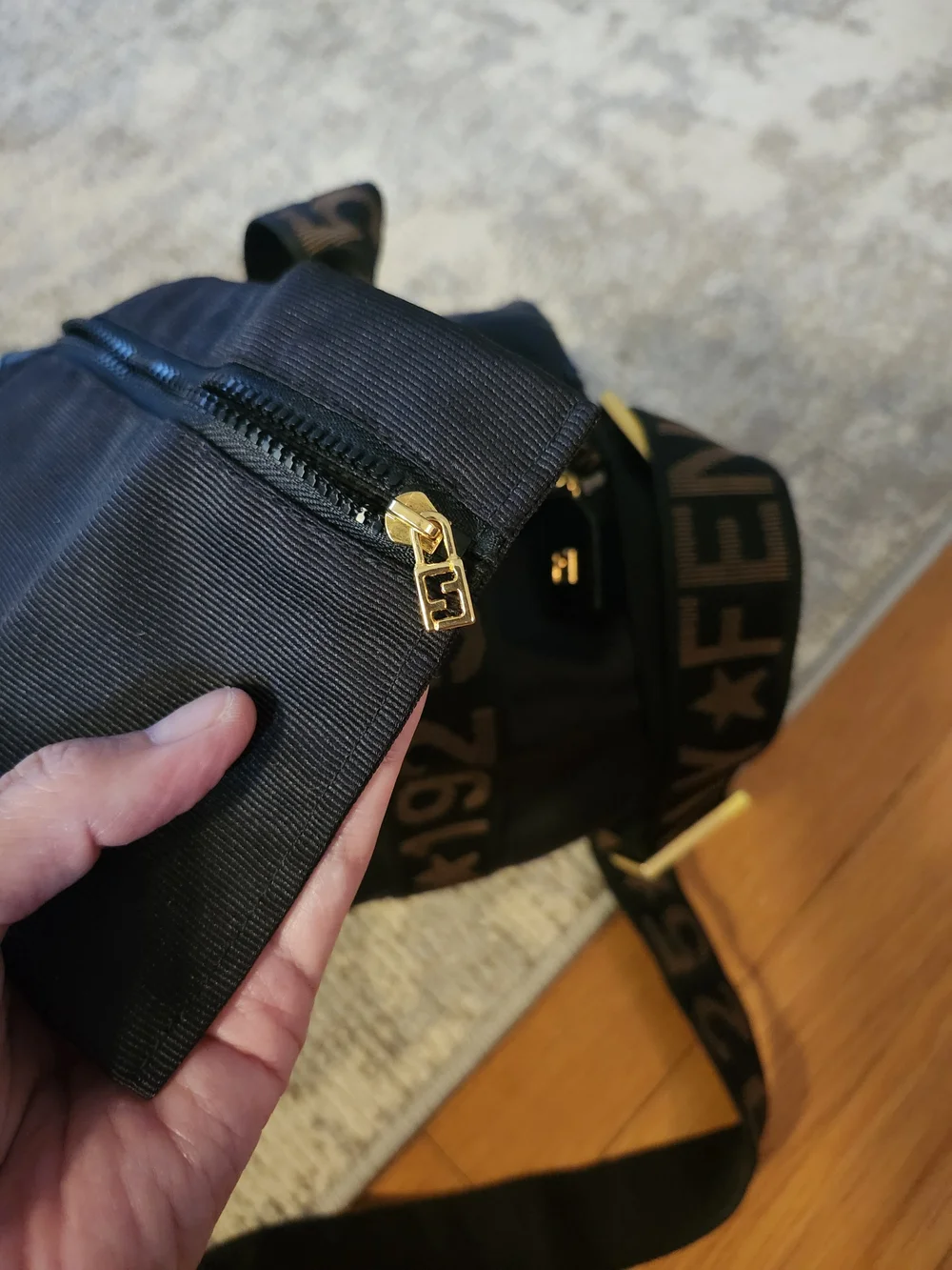 Fendi Black Duffel with Brown Branded Webbing Strap